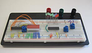 A breadboard circuit filled with jumper wires and components