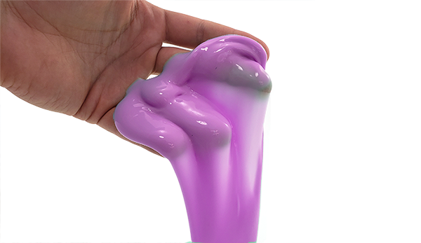 Slime in the hand and dripping from fingers 