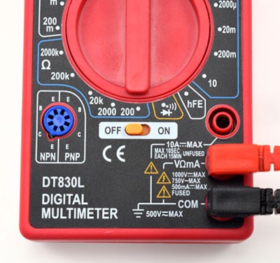 Two probes connect to a multimeter